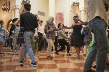 Chocolate Heads perform in the Green Library Rotunda.