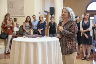 Paula Findlen speaks before the performance