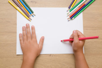 Girl ready to draw picture.