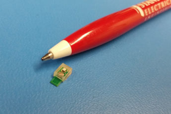 Sound powered chip next to a pen