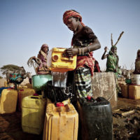 Fari Awade draws water from a well in the community of Natriguel, Mauritania.