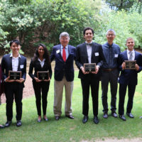 Students pose with their advisors.