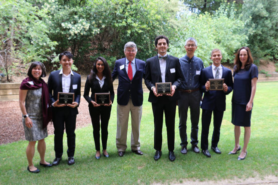 Students pose with their advisors.