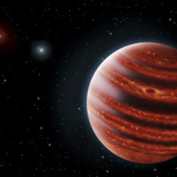 Artist’s conception portrays exoplanet 51 Eri b seen in near-infrared light, which shows the hot layers deep in its atmosphere glowing through clouds.