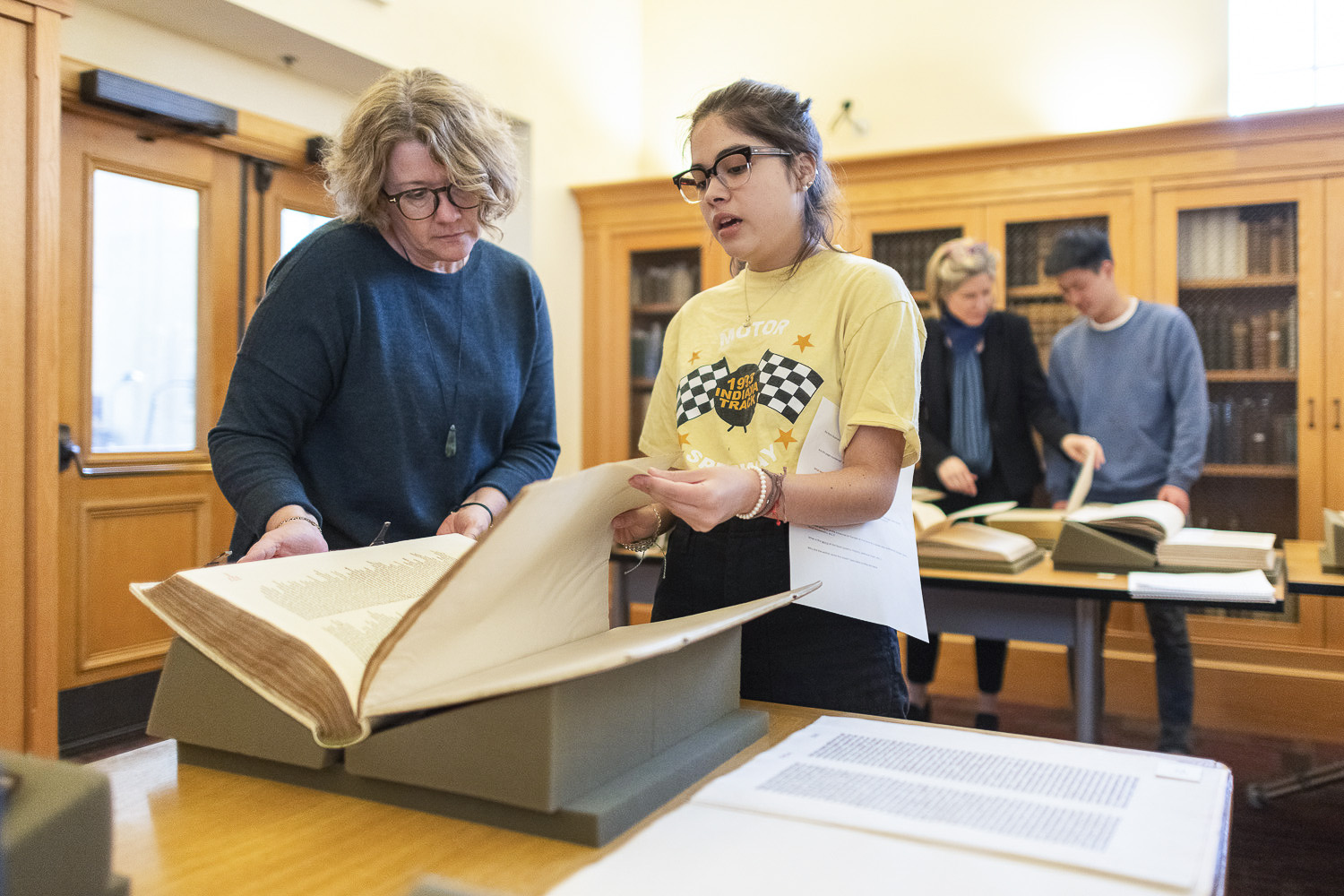 Professor Elaine Treharne works with Lore Olivera at Stanford Libraries Special Collections in the Humanities Research Intensive class taught over spring break.