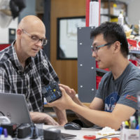 Rob Alexander, left, and Tony Chen