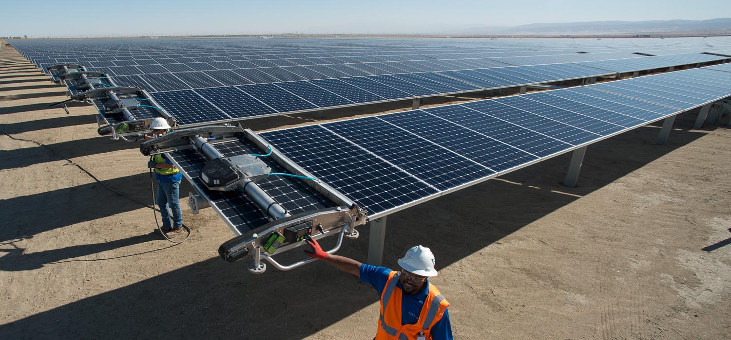 Robots clean a solar panel