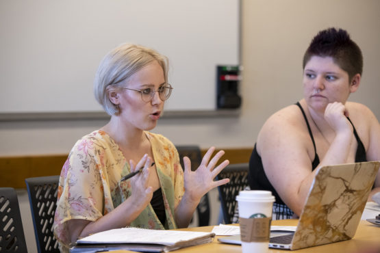 Claire Francis, left, and Kyle Ostrum during class.