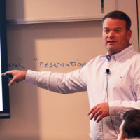 Brian Cook speaking to the Faculty Senate