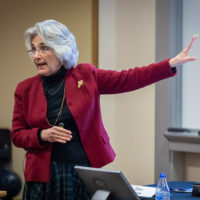 Persis Drell talking to Senate while gesturing