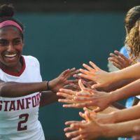 Naomi Girma greeting fans.