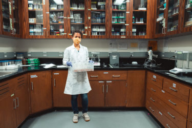 Cecilia Endriga working in the lab