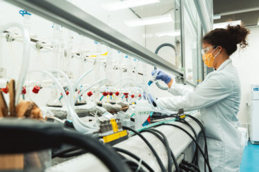 Cecilia Endriga working in the lab