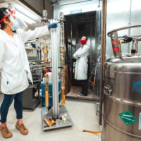 Connie Hsueh and Joe Finney in a lab in McCullough building