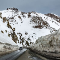 HOPE VALLEY, CA - APRIL 8: Canyons of snow greet drivers on Highway 88 as they cross the Sierra Nevada Crest over Carson Pass on April 8, 2022, near South Lake Tahoe, California. With record snow of 20-40 feet in many places this winter, communities in the Sierra Nevada are still digging out even as the temperatures rise and the snow begins to melt. (Photo by George Rose/Getty Images)