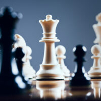 closeup of chess pieces on chessboard